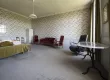 Chambre d'env. 32 m2 au 1er étage
