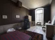 Chambre d'env. 15 m2 au 1er étage côté cour