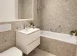 Salle_de_bain_moderne_aux_tons_pierre.png